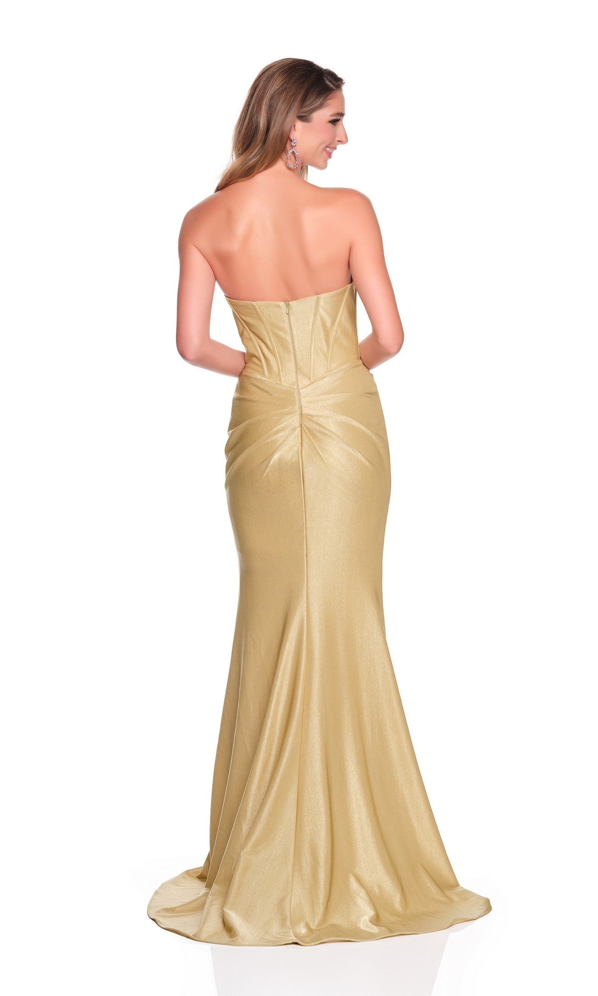 A woman faces away in the Dave and Johnny 12458 long prom dress, showing its gold strapless design with a fitted corset bodice and slight train against a white background.